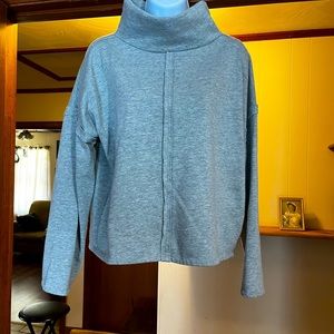 Small, funnel neck sweatshirt